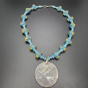 One-of-a-kind, blue and yellow hand-made glass and silver set.
